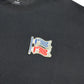AVENUE COOL TOUCH BADGE TEE (FLAG)