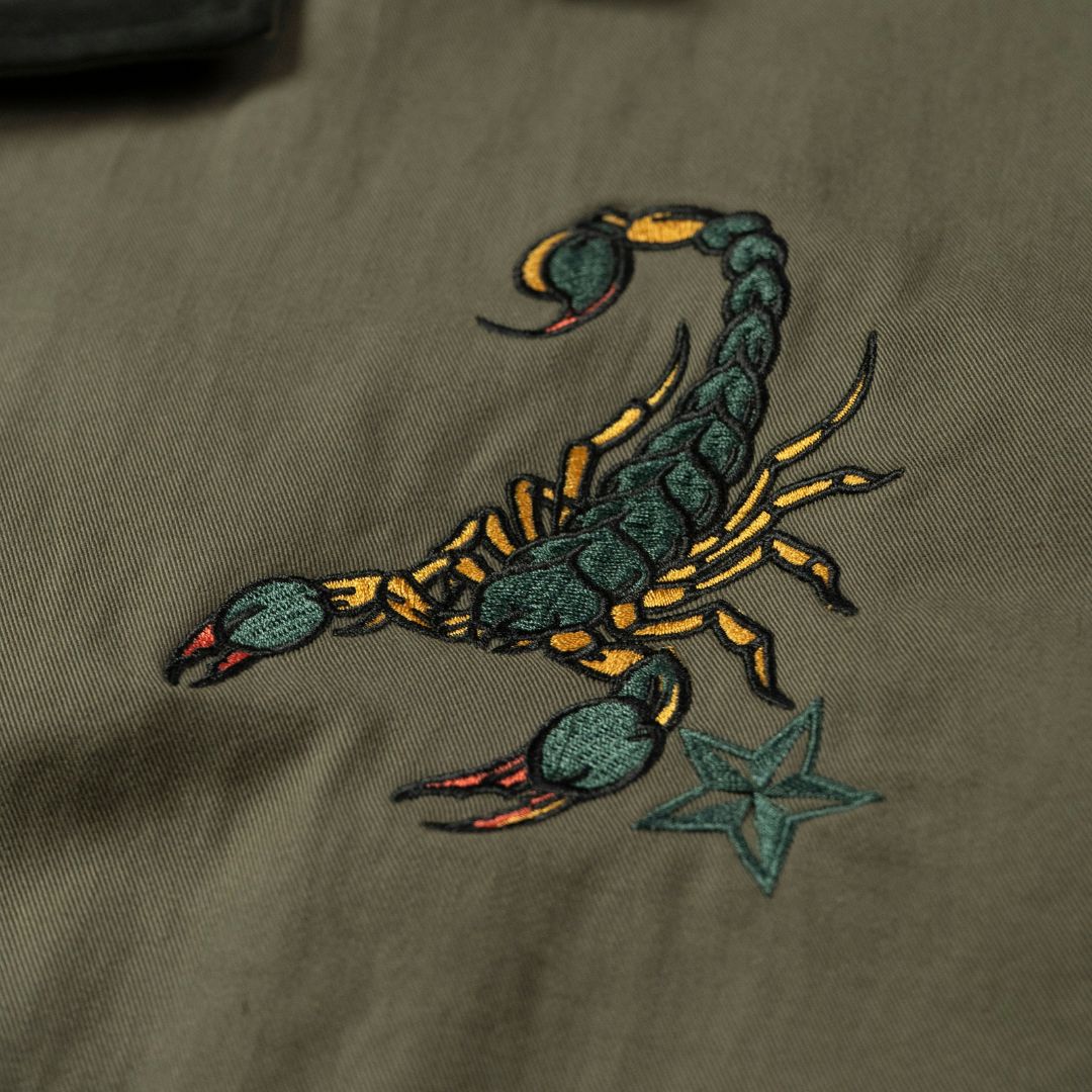 DUSTY INVINCIBLE EMB SHIRT