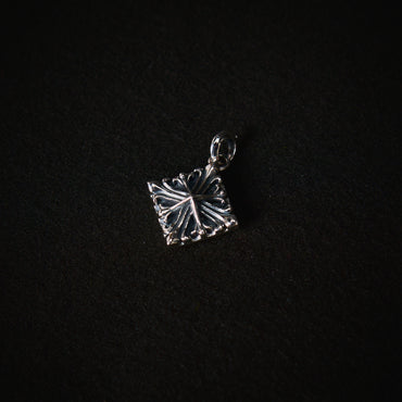 DUSTY SILVER CROSS LOCKET