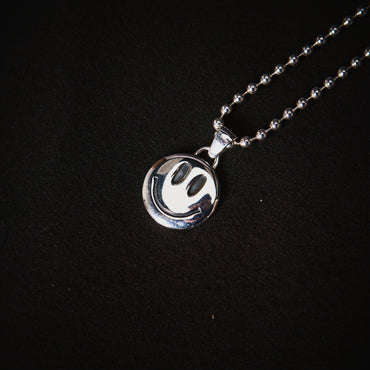 DUSTY SMILEY LOCKET